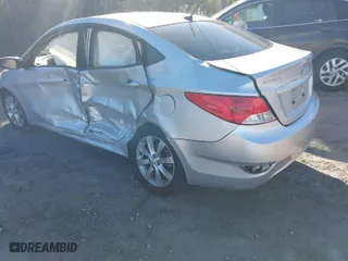 2014 Hyundai Accent GLS with VIN KMHCU4AE3EU603930, listed as a IAAI auction lot 41748640 with 269,813 mi miles. Bid and sale history available at carsss.com. Image 3.