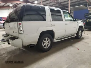 2000 Cadillac Escalade z VIN 1GYEK63R0YR185780, wystawiony jako Copart lot #80620994 z przebiegiem 16 717 mil mil oraz Szkody całkowita. Historia ofert i sprzedaży dostępna na DreamBid. Obrazek 3.