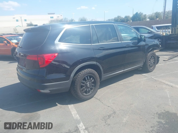 2016 Honda Pilot EX-L with VIN 5FNYF5H5XGB029595, listed as a IAAI auction lot 41561758 with 172,725 mi miles and . Bid and sale history available at DreamBid. Image 4.