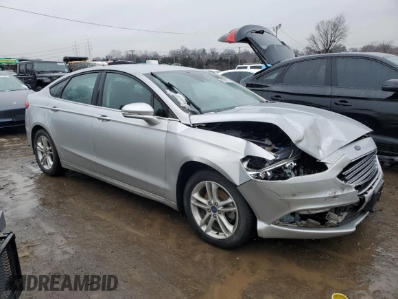 2018 Ford Fusion SE z VIN 3FA6P0H79JR270777, wystawiony jako Copart lot #45319755 z przebiegiem 69 152 mil mil oraz Szkoda całkowita • Salvage title. Historia ofert i sprzedaży dostępna na DreamBid. Obrazek 4.