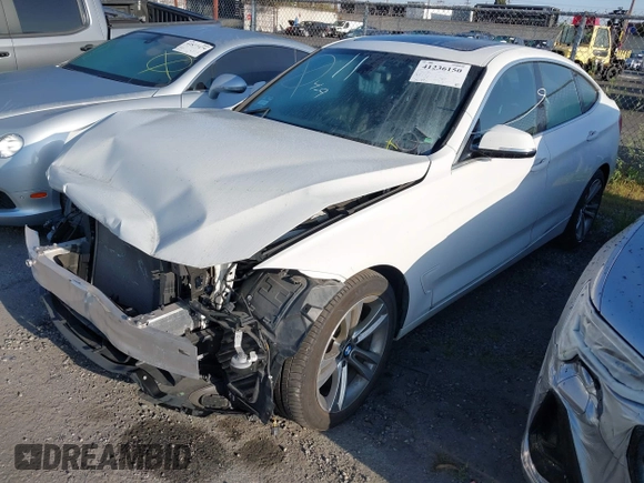 2018 BMW 3 Series 330i xDrive with VIN WBA8Z9C5XJG828406, listed as a IAAI auction lot 41236150 with 36,815 mi miles. Bid and sale history available at carsss.com. Image 20.