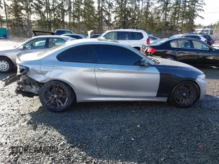 2015 BMW 2 Series 228i with VIN WBA1F5C55FV343662, listed as a IAAI auction lot 41729309 with 90,770 mi miles. Bid and sale history available at carsss.com. Image 14.