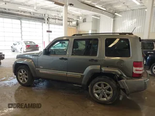 2012 Jeep Liberty Sport with VIN 1C4PJMAK9CW176792, listed as a IAAI auction lot 41685594 with 213,748 mi miles. Bid and sale history available at carsss.com. Image 13.