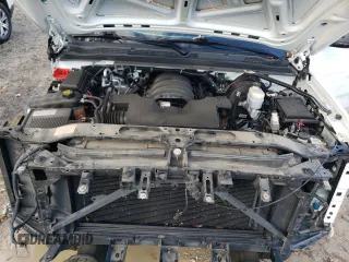 2020 Chevrolet Tahoe Commercial z VIN 1GNSKDEC8LR240143, wystawiony jako Copart lot #79911654 z przebiegiem 99 084 mil mil oraz Szkoda całkowita • Salvage title. Historia ofert i sprzedaży dostępna na DreamBid. Obrazek 12.