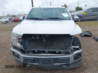 2018 Ford F-150 XL with VIN 1FTEW1E56JKC02331, listed as a IAAI auction lot 42554412 with 203,633 mi miles and . Bid and sale history available at DreamBid. Image 6.