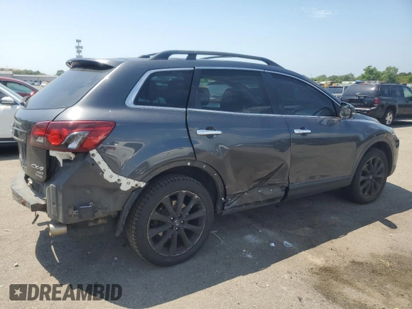 2014 Mazda CX-9 Grand Touring with VIN JM3TB3DV9E0444720, listed as a Copart auction lot 63687855 with 144,568 mi miles and Salvage title. Bid and sale history available at DreamBid. Image 3.