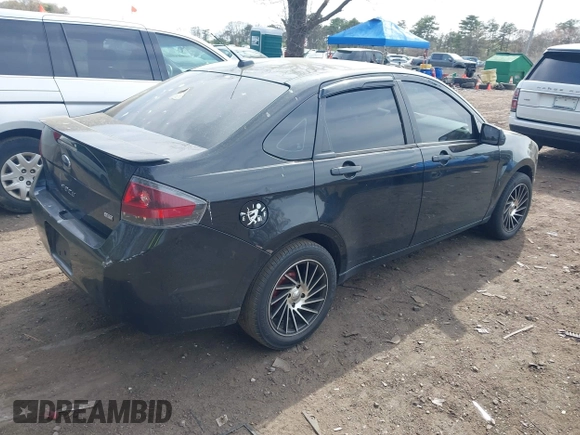 2011 Ford Focus SES with VIN 1FAHP3GN3BW107955, listed as a IAAI auction lot 42131679 with 187,709 mi miles. Bid and sale history available at carsss.com. Image 4.