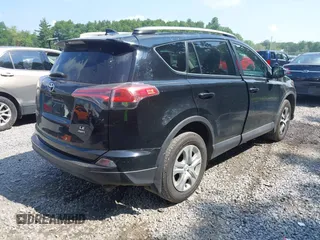 2017 Toyota RAV4 LE with VIN 2T3BFREV5HW651308, listed as a IAAI auction lot 42701783 with 112,829 mi miles and . Bid and sale history available at DreamBid. Image 4.