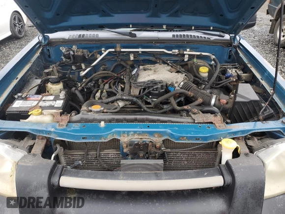 2001 Nissan Frontier SE with VIN 1N6ED27T71C398763, listed as a Copart auction lot 44035275 with 226,738 mi miles and Clean title. Bid and sale history available at DreamBid. Image 11.