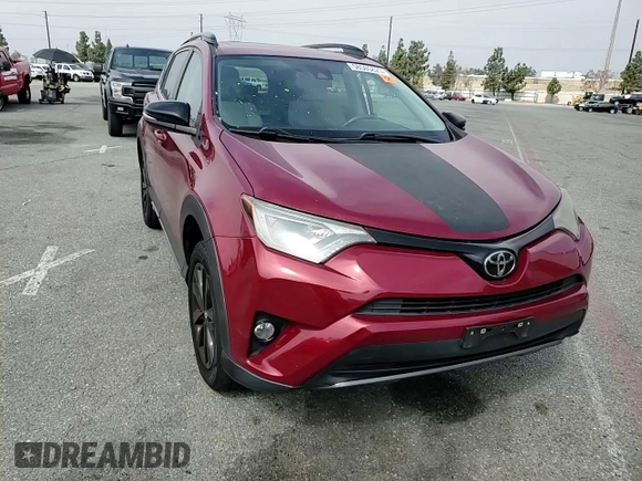 2018 Toyota RAV4 XLE with VIN 2T3WFREV0JW411011, listed as a Copart auction lot 58505825 with 91,787 mi miles and Salvage title. Bid and sale history available at DreamBid. Image 14.