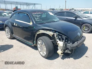 2013 Volkswagen Beetle 2.5L with VIN 3VWHX7AT3DM603962, listed as a IAAI auction lot 42329256 with 137,285 mi miles and . Bid and sale history available at DreamBid. Image 1.