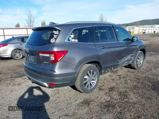 2019 Honda Pilot EX-L with VIN 5FNYF6H5XKB038196, listed as a IAAI auction lot 41852236 with 99,477 mi miles. Bid and sale history available at carsss.com. Image 4.