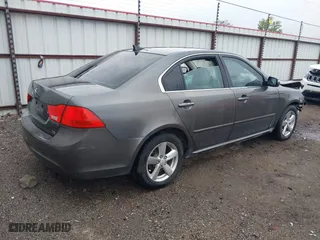 2009 Kia Optima LX with VIN KNAGE228995306982, listed as a IAAI auction lot 41898377 with 197,604 mi miles. Bid and sale history available at carsss.com. Image 4.