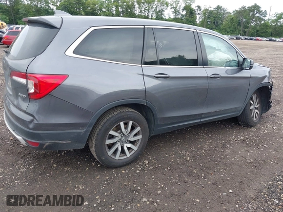2019 Honda Pilot EX-L with VIN 5FNYF6H5XKB096065, listed as a IAAI auction lot 42631239 with 171,768 mi miles and . Bid and sale history available at DreamBid. Image 4.