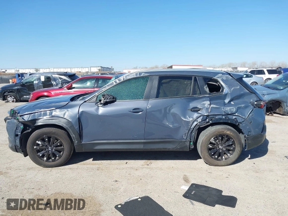 2024 Mazda CX-50 2.5 S Premium Package with VIN 7MMVABDMXRN194094, listed as a IAAI auction lot 41827010 with 7,115 mi miles. Bid and sale history available at carsss.com. Image 14.
