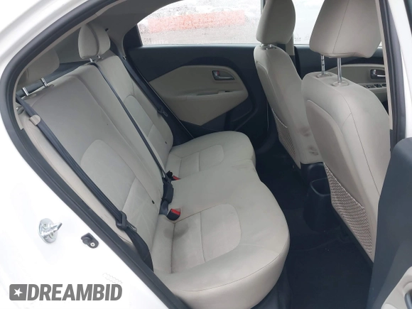 2013 Kia Rio LX with VIN KNADM5A34D6110013, listed as a IAAI auction lot 41306019 with 80,501 mi miles and . Bid and sale history available at DreamBid. Image 8.