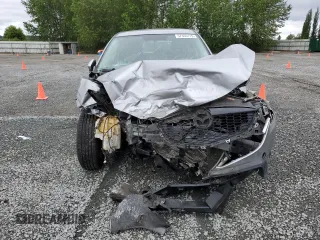 2014 Mazda CX-5 Touring z VIN JM3KE4CYXE0426408, wystawiony jako Copart lot #57355115 z przebiegiem Nie podano mil oraz Szkody całkowita. Historia ofert i sprzedaży dostępna na DreamBid. Obrazek 5.