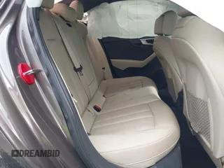2017 Audi A4 Premium Plus z VIN WAUENAF41HN015240, wystawiony jako IAAI lot #42199989 z przebiegiem 102 683 mil mil oraz . Historia ofert i sprzedaży dostępna na DreamBid. Obrazek 8.