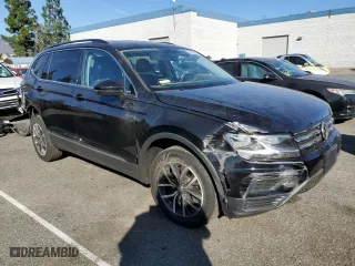 2020 Volkswagen Tiguan SE with VIN 3VV3B7AX2LM105721, listed as a Copart auction lot 79272814 with 59,887 mi miles and Salvage Title. Bid and sale history available at carsss.com. Image 4.