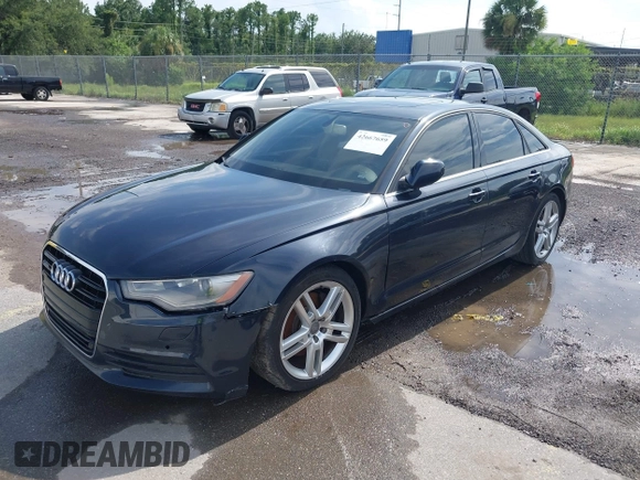 2014 Audi A6 Premium Plus with VIN WAUDFAFC7EN052529, listed as a IAAI auction lot 42667659 with 143,668 mi miles and . Bid and sale history available at DreamBid. Image 2.