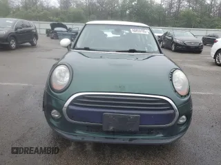 2017 MINI Hardtop Cooper with VIN WMWXP5C55H2D16587, listed as a Copart auction lot 60855195 with 77,769 mi miles and Salvage title. Bid and sale history available at DreamBid. Image 5.