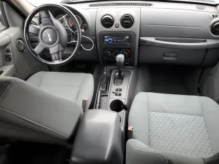 2005 Jeep Liberty Sport with VIN 1J4GL48535W610454, listed as a Copart auction lot 81914214 with 127,181 mi miles and Salvage Title. Bid and sale history available at DreamBid. Image 8.