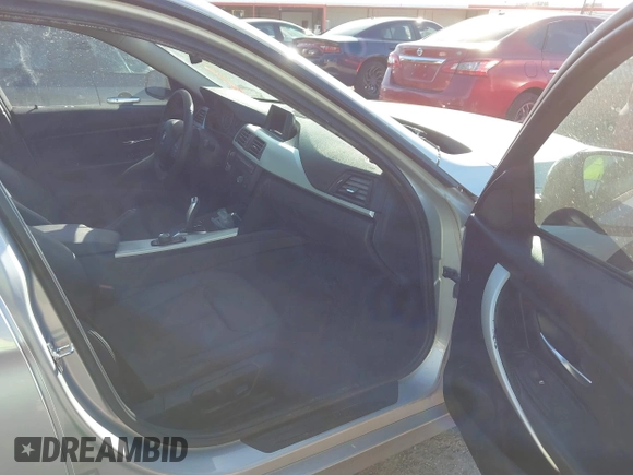 2012 BMW 3 Series 328i with VIN WBA3A5C5XCF345274, listed as a IAAI auction lot 41812072 with 142,024 mi miles. Bid and sale history available at carsss.com. Image 5.