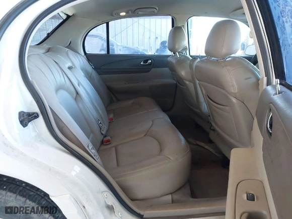 2000 Lincoln Continental with VIN 1LNHM97V9YY821894, listed as a IAAI auction lot 41657199 with 218,330 mi miles. Bid and sale history available at carsss.com. Image 8.