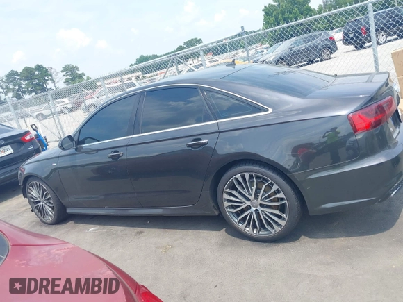 2016 Audi A6 Premium Plus with VIN WAUGFAFCXGN014941, listed as a IAAI auction lot 42566044 with 162,659 mi miles and . Bid and sale history available at DreamBid. Image 14.