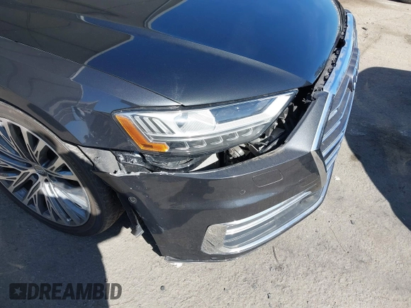 2019 Audi A8 z VIN WAU8DAF83KN006534, wystawiony jako IAAI lot #41712610 z przebiegiem 52 263 mil mil oraz . Historia ofert i sprzedaży dostępna na DreamBid. Obrazek 17.