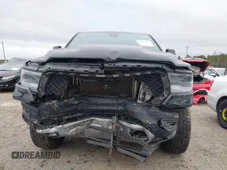 2019 Ram 1500 Rebel z VIN 1C6SRFLT1KN722064, wystawiony jako IAAI lot #41513201 z przebiegiem 113 559 mil mil oraz . Historia ofert i sprzedaży dostępna na DreamBid. Obrazek 13.