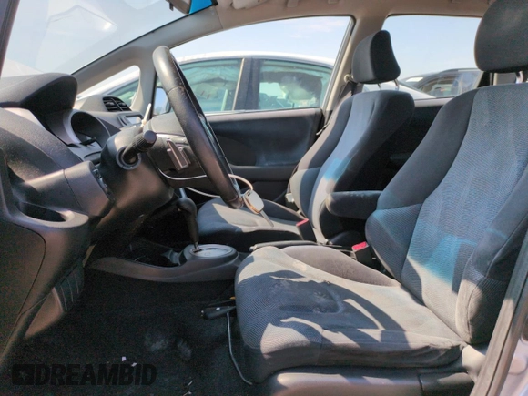 2010 Honda Fit Sport with VIN JHMGE8H41AC002070, listed as a Copart auction lot 62356565 with 148,279 mi miles and Salvage title. Bid and sale history available at DreamBid. Image 7.
