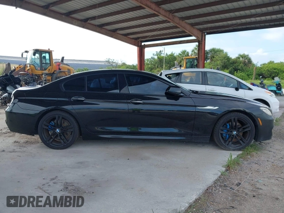 2014 BMW 6 Series 650i z VIN WBA6B2C57ED129681, wystawiony jako IAAI lot #42517803 z przebiegiem 208 644 mil mil oraz . Historia ofert i sprzedaży dostępna na DreamBid. Obrazek 14.