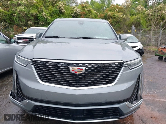 2024 Cadillac XT6 FWD Premium Luxury with VIN 1GYKPCRS0RZ748048, listed as a IAAI auction lot 42043117 with 7,232 mi miles. Bid and sale history available at carsss.com. Image 12.
