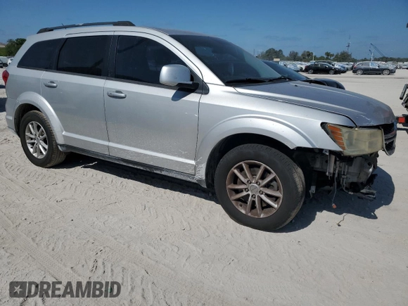 2014 Dodge Journey SXT with VIN 3C4PDCBG2ET127048, listed as a Copart auction lot 54823955 with 170,526 mi miles and Clean Title. Bid and sale history available at carsss.com. Image 4.