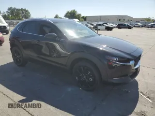 2023 Mazda CX-30 Premium Plus with VIN 3MVDMBEY0PM578346, listed as a Copart auction lot 58572345 with 14,027 mi miles and Salvage title. Bid and sale history available at DreamBid. Image 4.