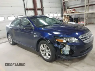 2011 Ford Taurus SEL with VIN 1FAHP2EW7BG174493, listed as a IAAI auction lot 41697856 with 143,957 mi miles. Bid and sale history available at carsss.com. Image 1.