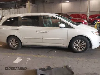 2014 Honda Odyssey EX-L with VIN 5FNRL5H60EB030841, listed as a IAAI auction lot 42271401 with 107,343 mi miles and . Bid and sale history available at DreamBid. Image 14.
