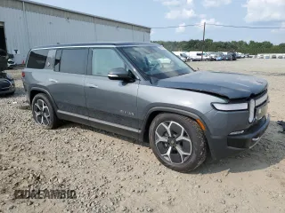 2024 Rivian R1S Adventure z VIN 7PDSGBBA0RN038679, wystawiony jako Copart lot #66486464 z przebiegiem Nie podano mil oraz Szkody całkowita. Historia ofert i sprzedaży dostępna na DreamBid. Obrazek 4.