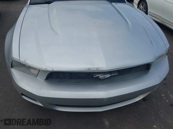 2011 Ford Mustang V6 with VIN 1ZVBP8EM8B5118122, listed as a IAAI auction lot 42644272 with 171,930 mi miles and . Bid and sale history available at DreamBid. Image 6.