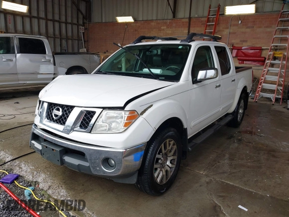 2011 Nissan Frontier Pro-4X with VIN 1N6AD0EV3BC409184, listed as a IAAI auction lot 42122823 with 209,669 mi miles and . Bid and sale history available at DreamBid. Image 17.