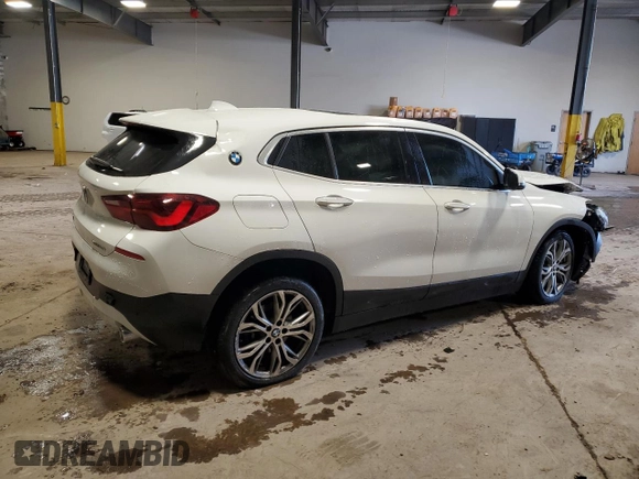 2022 BMW X2 xDrive28i with VIN WBXYJ1C03N5T55985, listed as a Copart auction lot 87183574 with 33,134 mi miles and Salvage Title. Bid and sale history available at carsss.com. Image 3.