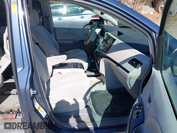 2014 Toyota Sienna LE with VIN 5TDJK3DC4ES087457, listed as a IAAI auction lot 41773128 with 103,993 mi miles and . Bid and sale history available at DreamBid. Image 5.
