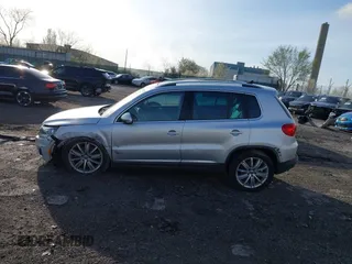 2013 Volkswagen Tiguan S with VIN WVGAV3AX0DW572915, listed as a IAAI auction lot 41937763 with 65,136 mi miles and . Bid and sale history available at DreamBid. Image 14.