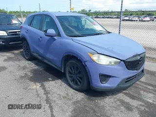 2013 Mazda CX-5 Sport with VIN JM3KE2BE8D0160381, listed as a IAAI auction lot 42438461 with 213,354 mi miles and . Bid and sale history available at DreamBid. Image 1.