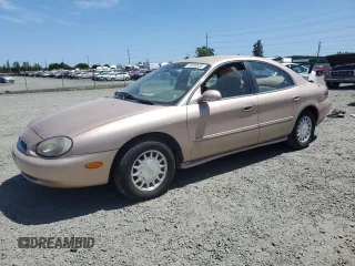 1996 Mercury Sable LS z VIN 1MELM53S8TA610706, wystawiony jako Copart lot #59506535 z przebiegiem 64 513 mil mil oraz Tytuł czysty. Historia ofert i sprzedaży dostępna na DreamBid. Obrazek 1.
