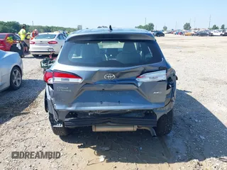 2022 Toyota Corolla Cross L with VIN 7MUAAABGXNV035110, listed as a IAAI auction lot 42562359 with 17,106 mi miles and . Bid and sale history available at DreamBid. Image 17.
