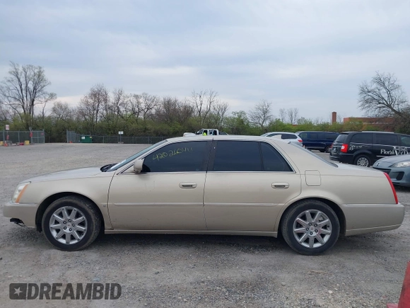 2009 Cadillac DTS w/1SA with VIN 1G6KD57Y29U137410, listed as a IAAI auction lot 42026044 with 112,916 mi miles. Bid and sale history available at carsss.com. Image 14.