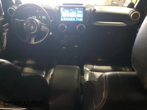 2012 Jeep Wrangler Unlimited Sahara with VIN 1C4BJWEG8CL235893, listed as a Copart auction lot 58195585 with 142,179 mi miles and Salvage title. Bid and sale history available at DreamBid. Image 8.