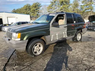 1996 Jeep Grand Cherokee with VIN 1J4EZ58S9TC148692, listed as a Copart auction lot 87730075 with Not provided miles and Salvage title. Bid and sale history available at DreamBid. Image 1.